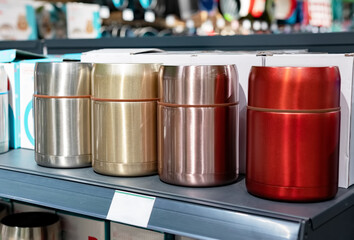 Colored thermos in the shop window