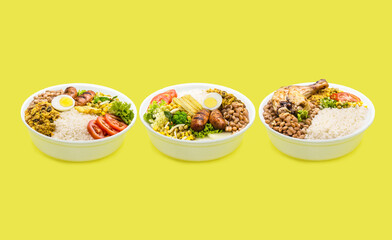 marmita or marmitex, Brazilian home-delivered lunch meal, with rice, sausage, farofa and salad, beans, copy space, yellow background