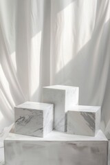Minimalist Marble Blocks Display on Neutral Background