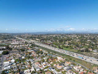Aerial view of highway transportation with small traffic, highway interchange and junction, San...