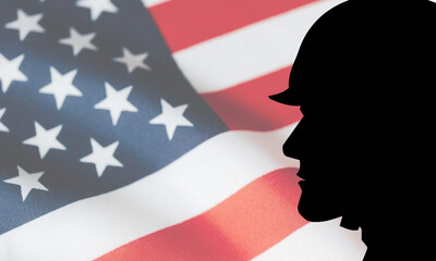Soldier silhouette with background of USA flag for memorial day, Independence day and other patriotic events.