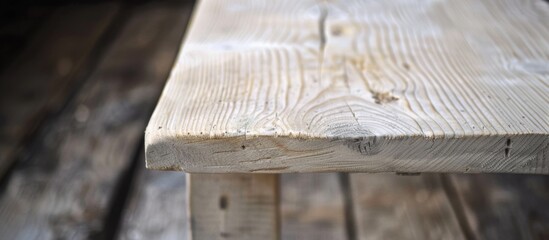 A wooden bench resting on a wooden floor