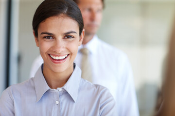 Woman, smiling and professional in portrait for corporate employment, office job or career...