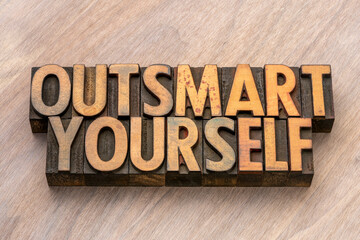 outsmart yourself words in letterpress wood type, overcoming self-imposed limitations, biases, and obstacles in order to achieve personal growth, success, and fulfillment - obrazy, fototapety, plakaty