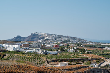 View from Pyrgos Kallistis village towards the towns of Messaria, Fira and Imerovigli. Greek Islands, Santorini, European Vacation. Travel, holidays, relax, adventure.