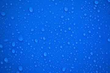 cool water drops on blue background
