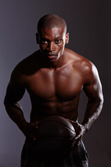 Fototapeta na wymiar Blackman, studio and dark background or basketball or shirtless at night, sports or fitness or athlete. Sportsman, healthy and muscular with confidence for game or exercise, focus and strength