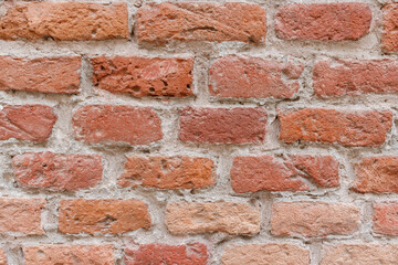Orange brick wall close up