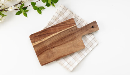 Kitchen wooden cutting board top view, serving dish empty space design, tableware on white.