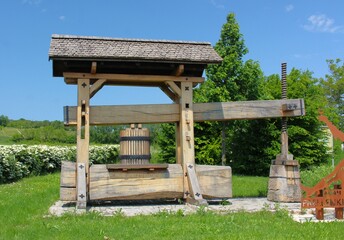 Traditional central European well with wooden bucket