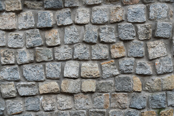 Wall old stones, paving stones background, stone masonry texture