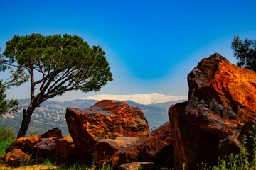 looking at the snow covered Sannine mountain in Lebanon during spring season