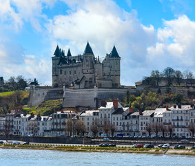 View of the Saumur castle from the other side of the river Loire, France. Constructed in the 10th century, was rebuilt in the later 12th century.