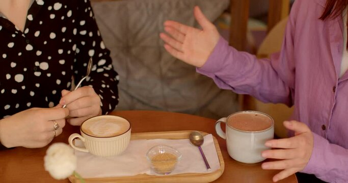 Communication no face people during breakfast or brunch involves sipping coffee or cocoa while engaging in conversation. Cozy, warm and relaxed atmosphere for strengthens interpersonal relationships.