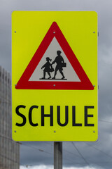 Warning road sign School