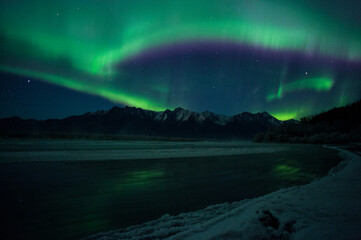 Northern lights in the sky over Alaska foreground