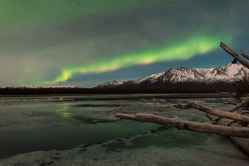 Northern lights in the sky over Alaska foreground