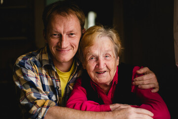 Portrait of a man with his grandmother. - 776202507