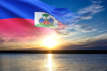 Flag of Haiti against the sunset