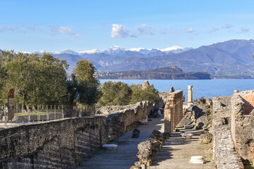 View of the Grottoes of Catullo, the ruins of a Roman villa built at the end of the 1st century B.C. on the shore of Lake Garda, Sirmione, Brescia, Lombardy, Italy