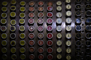 Buttons of vintage mechanical cash register