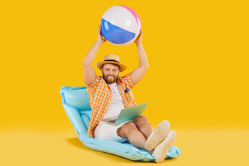 Funny happy man tourist in casual clothes sitting on inflatable mattress with beach ball booking...