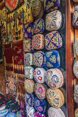 Traditional kufi skull caps at a store in Bukhara. - 776225711