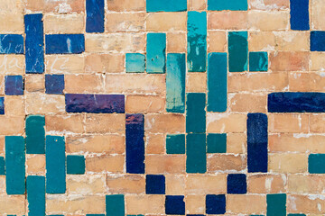 Decorative tiles on a brick wall at the Kalan Mosque in Bukhara. - 776226193
