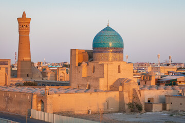 Dome and minaret of the Kalan Mosque in Bukhara. - 776229329