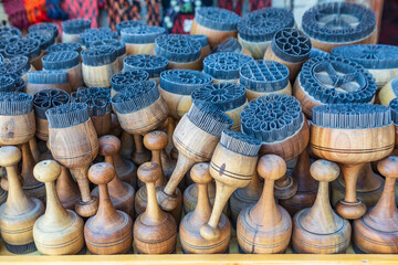 Tools for decorating baked goods at a market in Bukhara. - obrazy, fototapety, plakaty