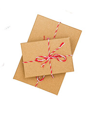 Cardboard gift boxes set with a red and white ribbon bow