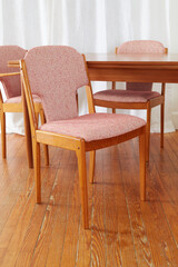 Wooden Dining Chairs with Pink Cushion Close-Up
