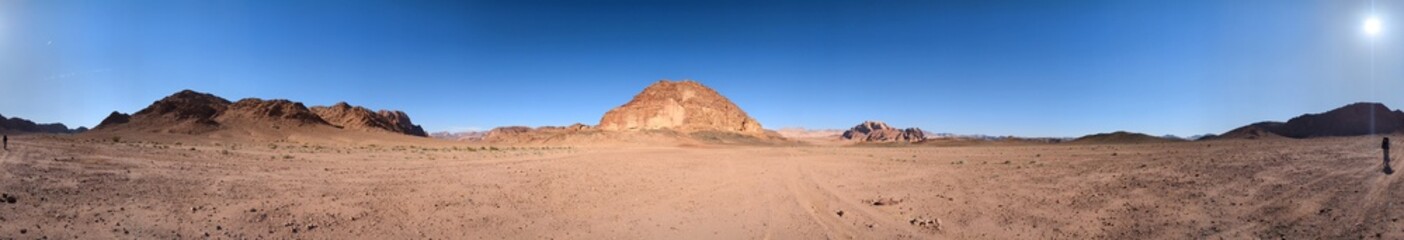 Fototapeta premium Wadi Rum desert panorama landscape view with sand dunes and rocky formations,Mountains terrain Jordan