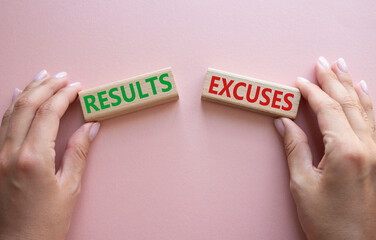 Results or Excuses symbol. Concept word Results or Excuses on wooden blocks. Businessman hand. Beautiful pink background. Business and Results or Excuses concept. Copy space - obrazy, fototapety, plakaty