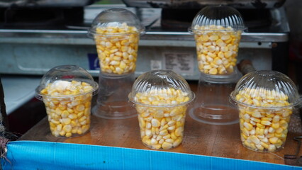sweet corn in plastic cup