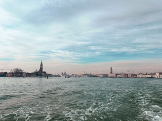 Distant view of Venice architecture from water canal