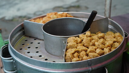 Cilok snack in a steamer