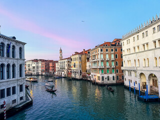 View of water Grand canal in Venice from famous Rialto bridge. Old medieval architecture in Italy
