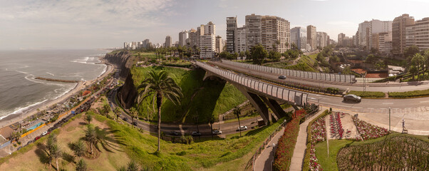 Lima, Peru: Panoramic drone image of the boardwalk of Miraflores with view of the Villena bridge,...