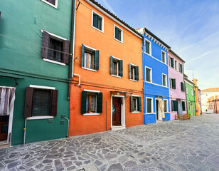 Fototapeta na wymiar Colorful houses facades in famous island near Venice, Burano, Italy 