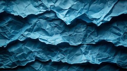   A tight shot of a blue wall with a fold of blue paper along its side, accompanied by the upper wall section in the background - obrazy, fototapety, plakaty