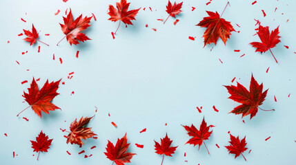 Minimalistic blue background with red scattered maple leaves