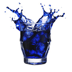 Drink dark blue ice cubes in a glass with splashes isolated on a transparent and white background. PNG.