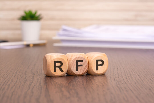 letters RFP written on wooden cubes. Request For Proposal concept