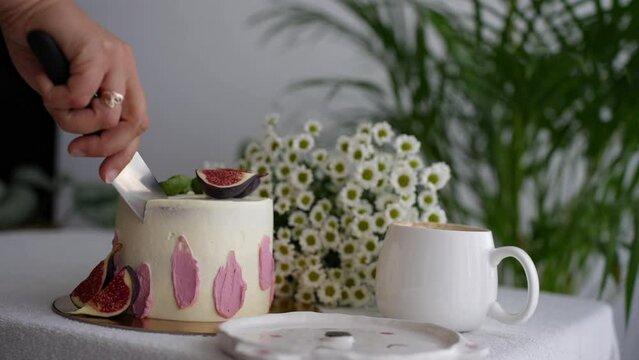 Cake, flowers and a mug of coffee 