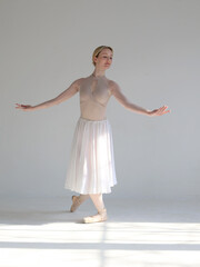 Beautiful ballerina dancing between light and shadows Psychology , emotions concept