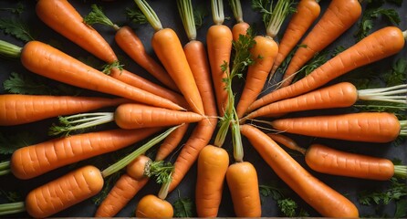 Orange carrots with green leaves. Fresh vegetables background. Top view - obrazy, fototapety, plakaty