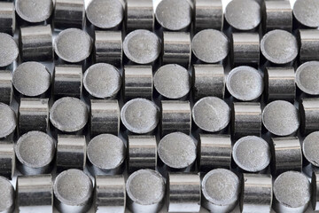 Zinc oxide chromium copper catalyst cylinder pellet form shape methanol synthesis industrial petrochemical background selected focus close up macro geometric ornamental shot.