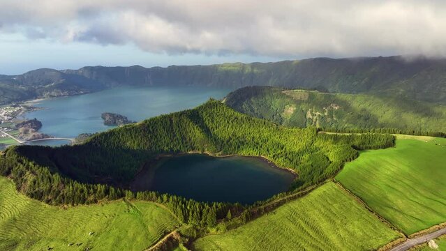green mountains of Sao Miguel island in atlantic ocean, Azores, Portugal, Europe. Overhead view of green farm meadows covering island area