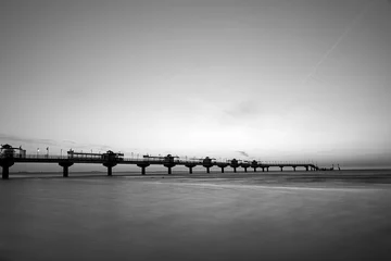 Fotobehang concrete pier on the Baltic Sea In the evening in Miedzyzdroje © GKor